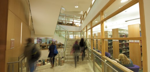 Students on stairs in McClay Library